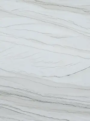 White Macaubas quartzite, white background with a subtle bluish vein
