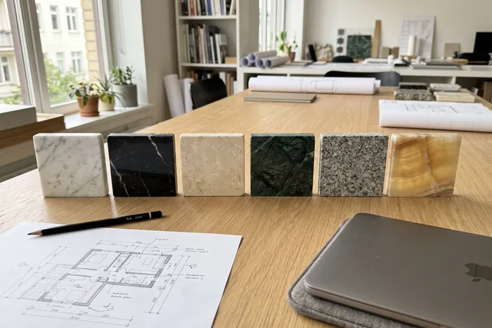 Marble, granite and onyx samples on a table