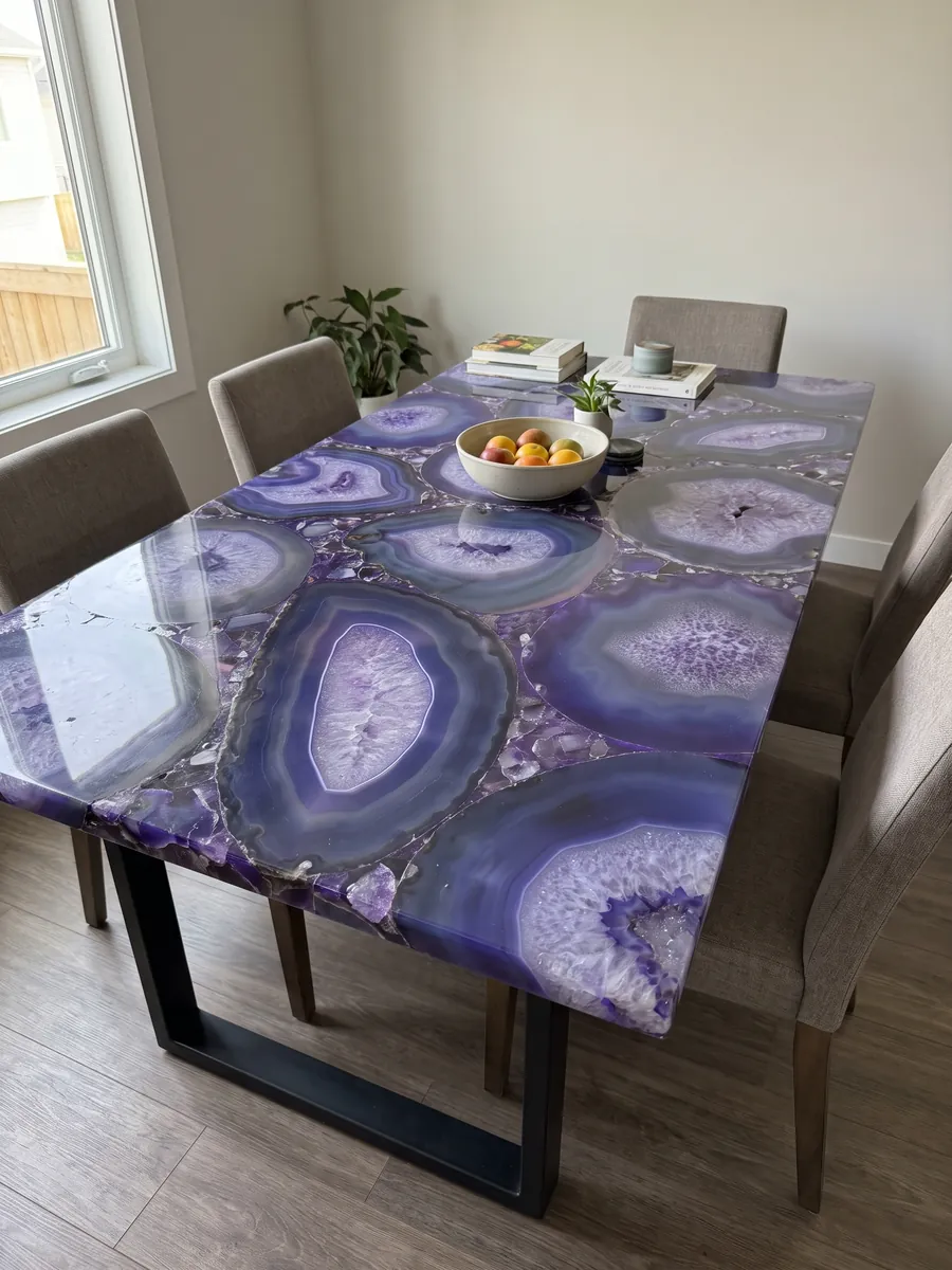 Dining table with a Purple Agate top on a steel base: large slices of blue-violet agate with crystalline lilac centers