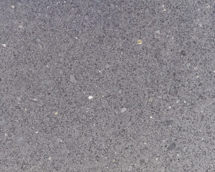 Slab of Lavagrigia basalt: granular violet-gray with white inclusions
