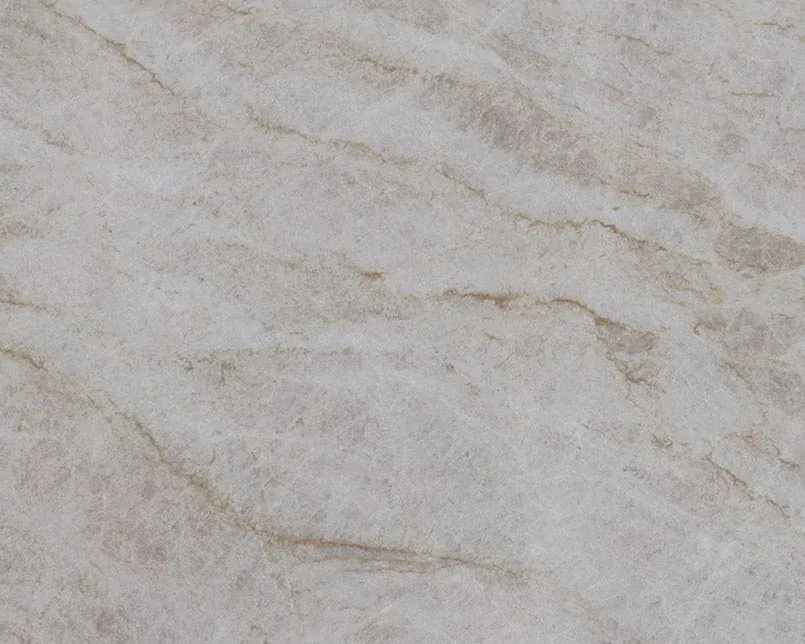 Slab of Taj Mahal quartzite with a cream background and soft gold veins