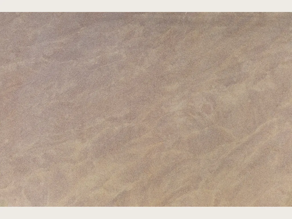 Santafiora Venata sandstone slab: sandy beige background with light and pinkish wavy bands in diagonal