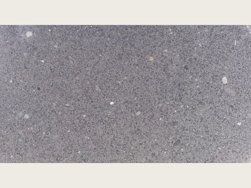 Lavagrigia basalt slab: purplish gray with a salt and pepper grain and loose white dots