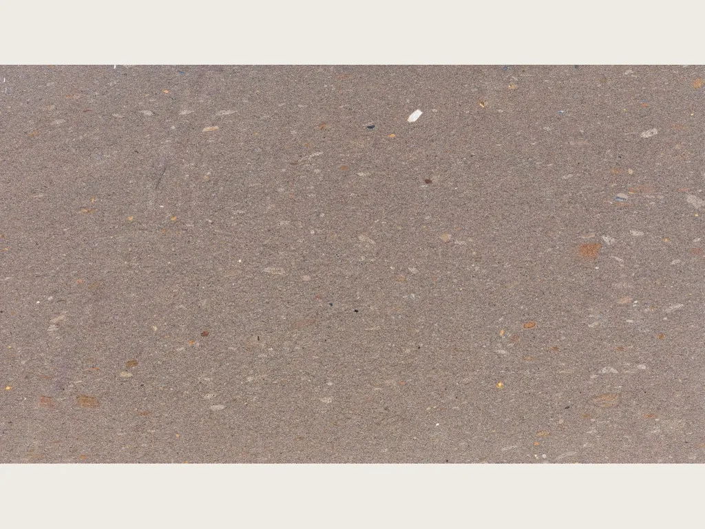 Lavarosa basalt slab: pinkish taupe, fine grained, with white and rust inclusions