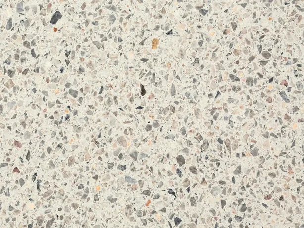 Fior di Pesco White detail: gray and dark speckles in small and medium sizes over the ivory background