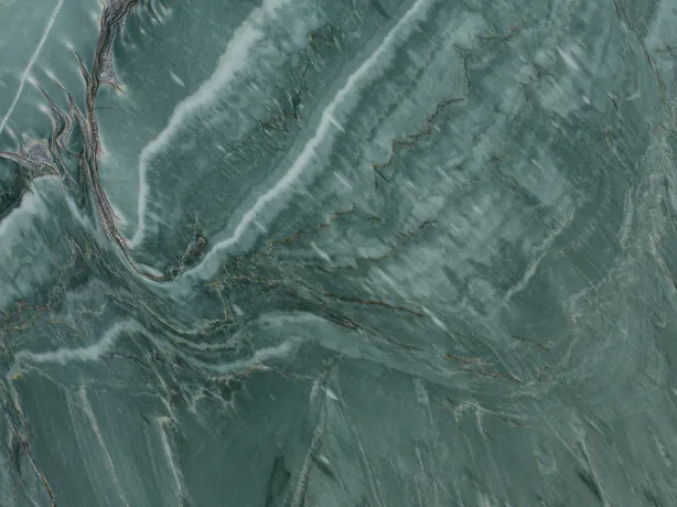 Detail of green Amazzonia Green quartzite: the dark brown veins crossing the white waves