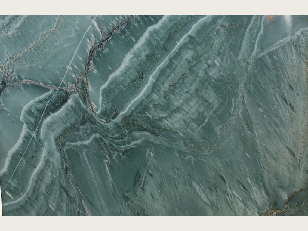 Green Amazzonia Green quartzite slab: grayish jade green with diagonal white waves and fine dark brown veins