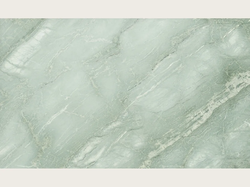 Green Aquamarine quartzite slab: pale aqua background with diagonal white veins and light clouds