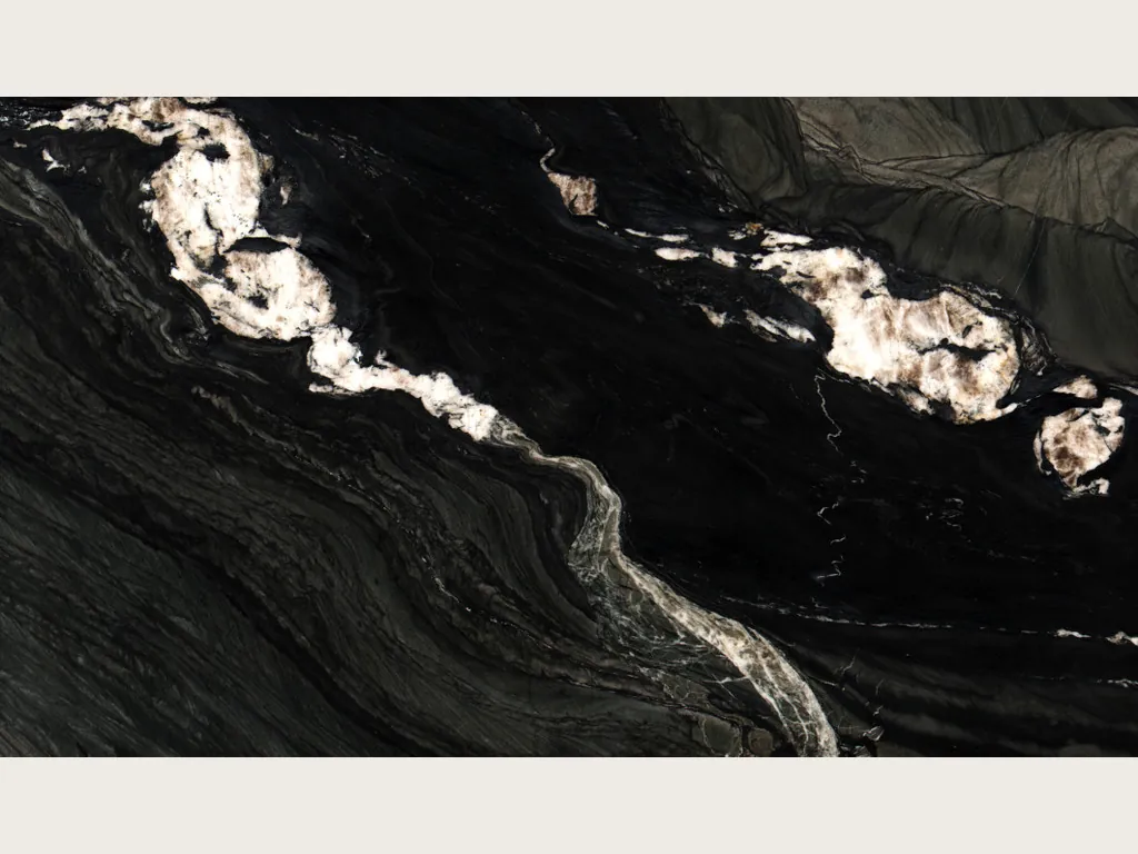 Black Tempest quartzite slab: deep black background with fine gray waves and creamy white patches lined up in a diagonal