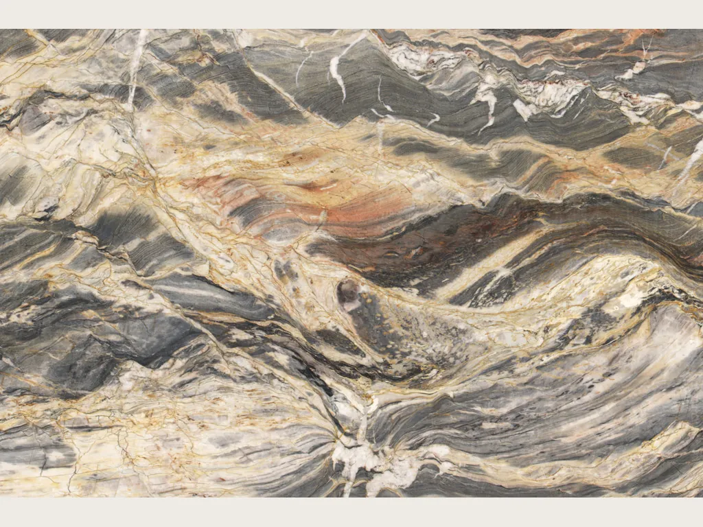 Slab of beige Colorado quartzite: wavy horizontal bands in dark gray and cream with orange touches