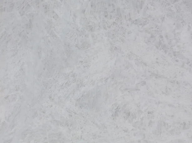 Detail of grey Cristallo quartzite: very soft clouds over the pearl-grey background