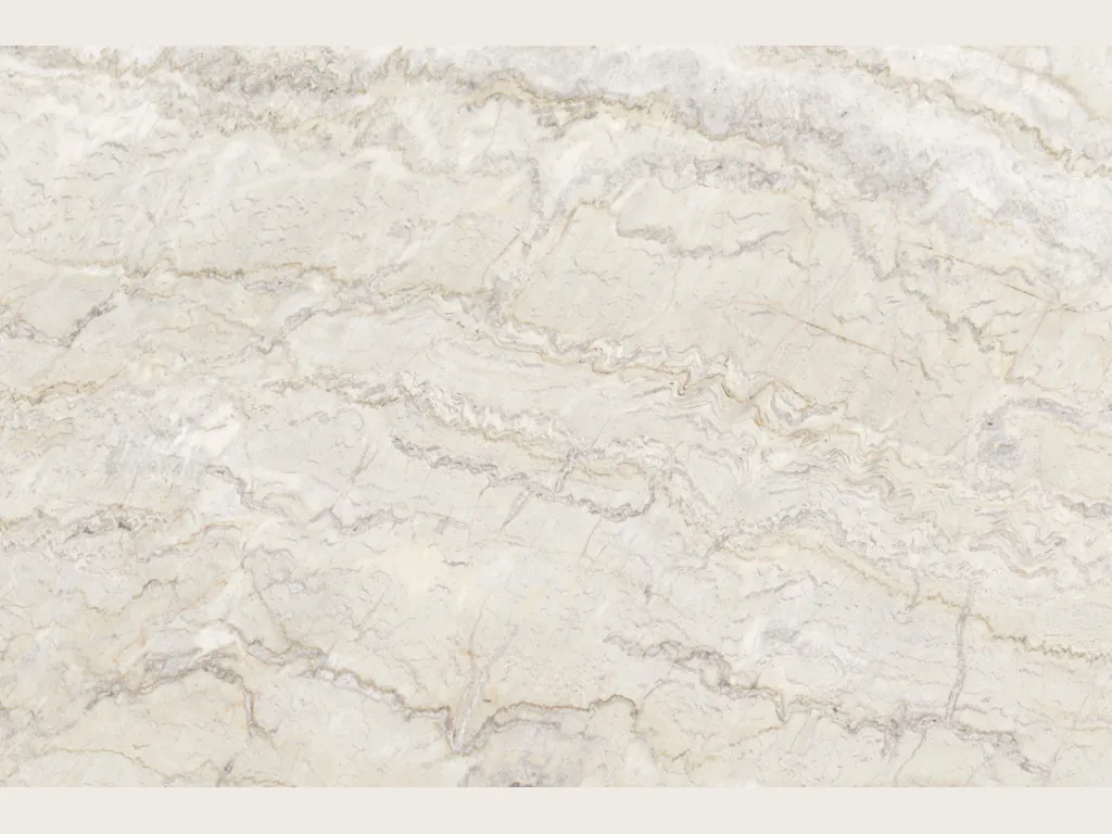 Slab of white Dolce Vita quartzite: creamy white with fine gray veins waving horizontally