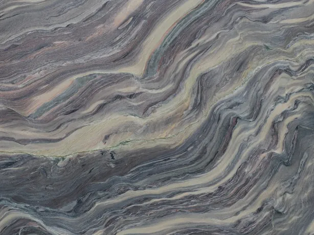 Detail of Explosion Blue quartzite: tight cream and blue grey bands with a polished shine