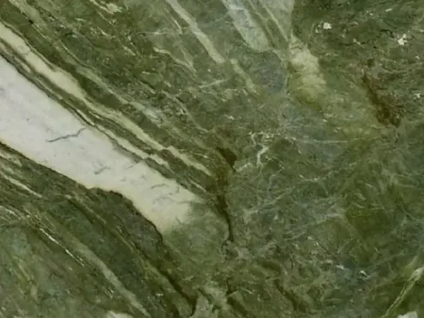 Slab of Green Prairie quartzite: intense moss green with greenish white diagonal bands and a fine network of light veins
