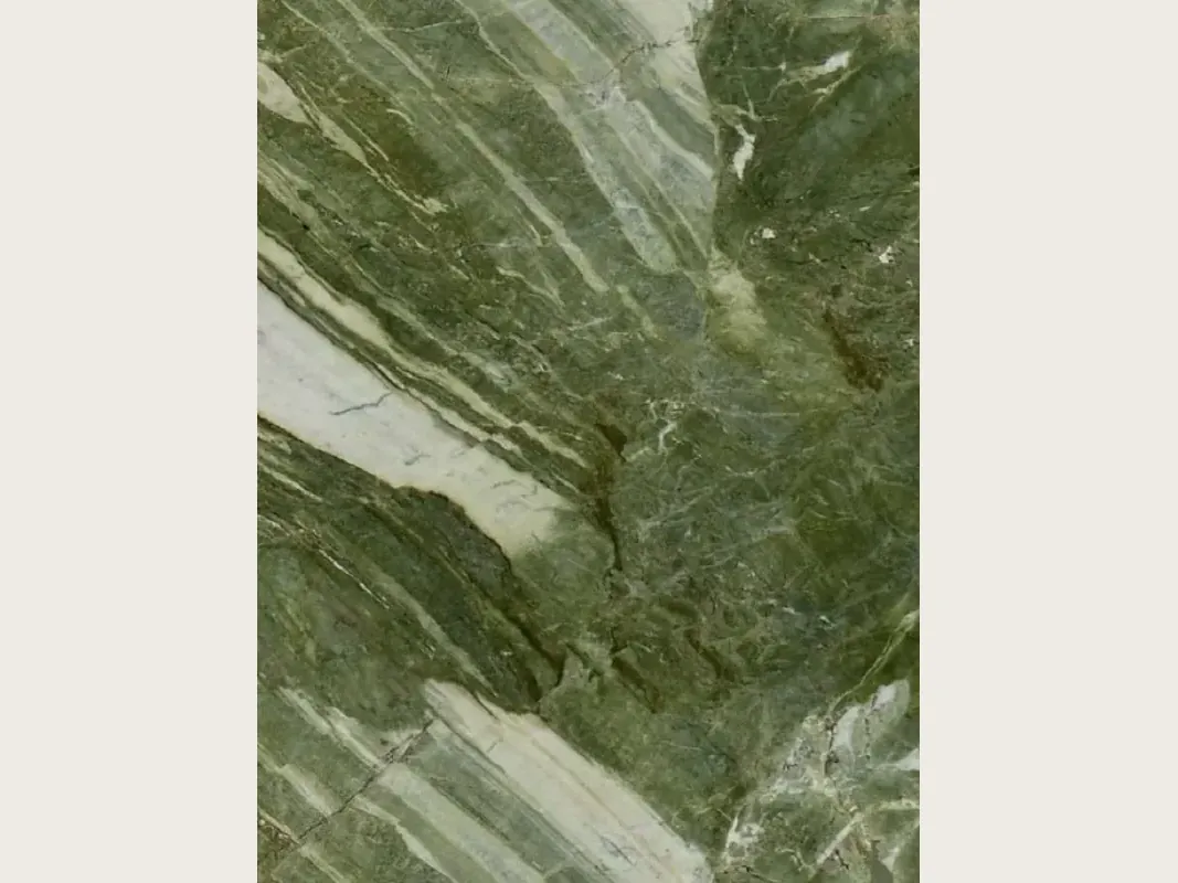 Green Prairie quartzite slab: intense moss green with greenish white diagonal bands and a fine network of light veins
