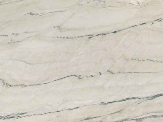 Close-up of white Macaubas Fantasy quartzite: the wavy gray-green lines over the warm white