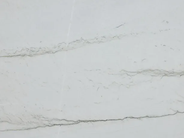 Detail of Mont Blanc white quartzite: very fine gray lines over the white, with the shine of the polish