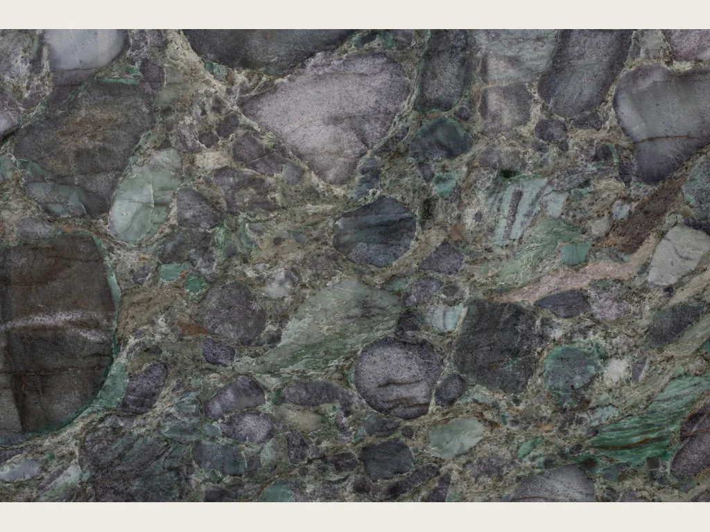Palladium Green quartzite slab: violet-gray clasts joined by a green matrix with emerald glints