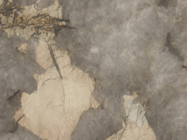 Detail of Patagonia gray quartzite: cream beige patches and cloudy gray with fine dark lines