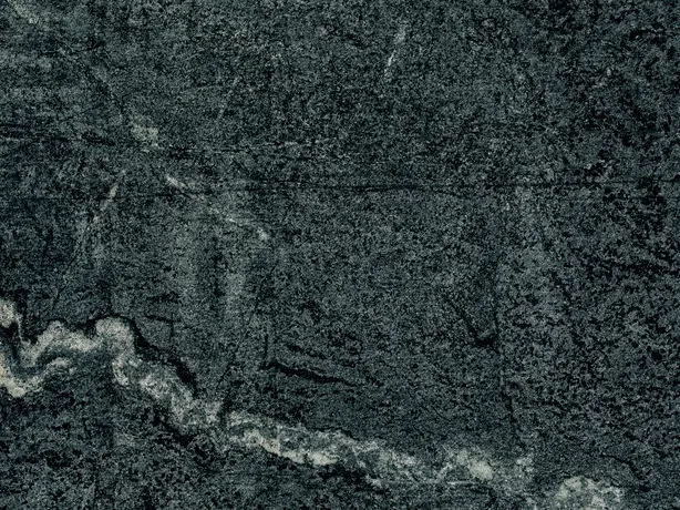 Detail of green Pietra Ollare quartzite: fine grain, white lines and blackish green in matte