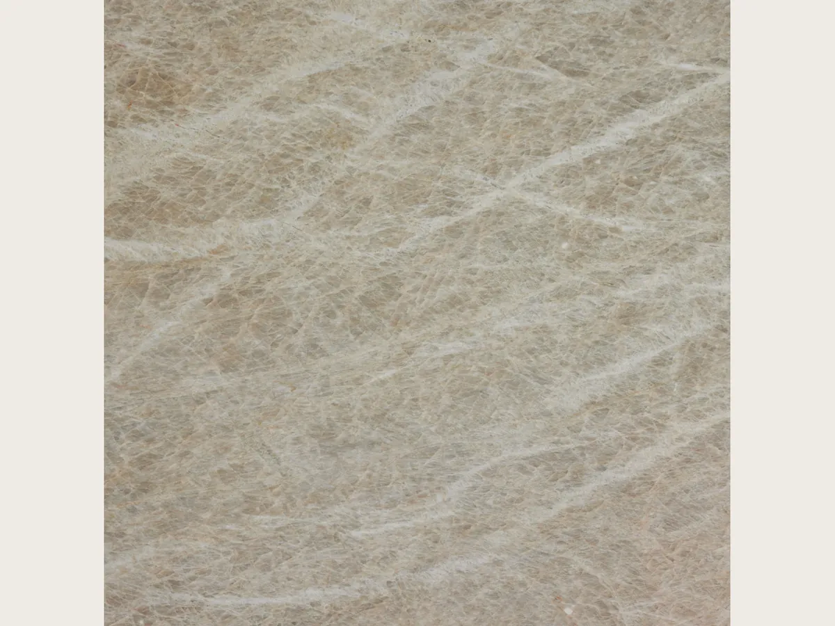 Slab of beige Taj Mahal quartzite: light beige background with soft caramel veins in a diagonal (another slab)
