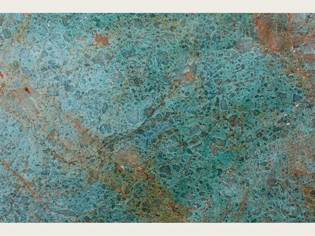 Slab of green Tanzanite quartzite: dense turquoise speckling with a diagonal rust red band