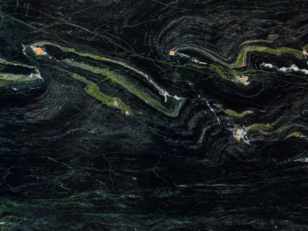 Close-up of Vancouver black quartzite with lime green bands over the dark background