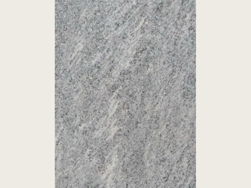 Gray Beola Grigia granite slab: a fine-grained light gray with soft diagonal streaks, matte