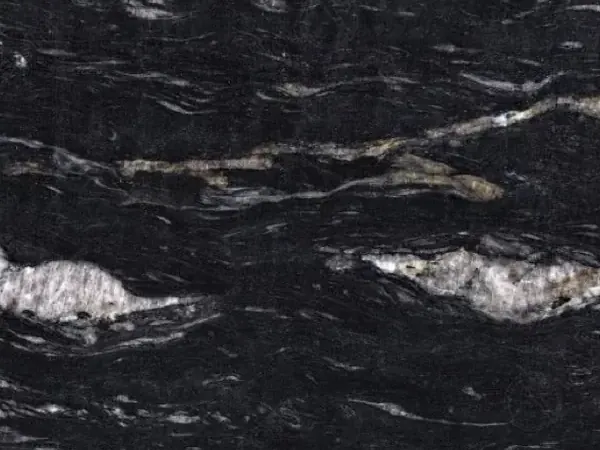 Cosmic Black granite slab: black with wavy white and gray veining and white patches, polished