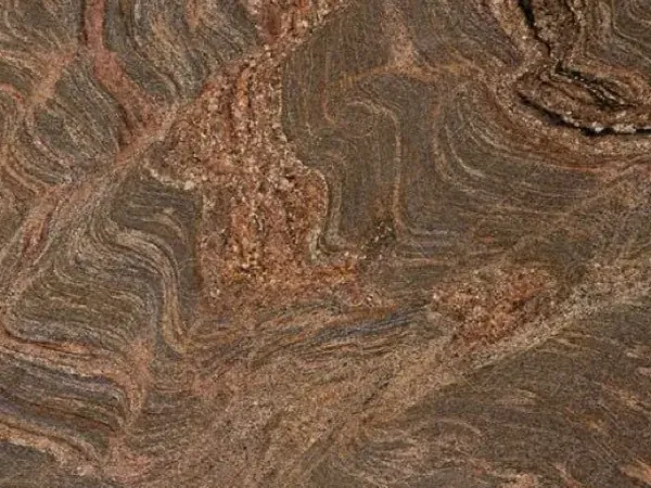 Juparana Dourado granite slab: ocher brown with reddish and dark waves and swirls