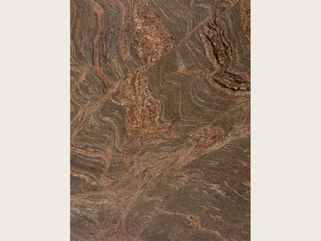 Juparana Dourado granite slab: ocher brown with reddish and dark waves and swirls