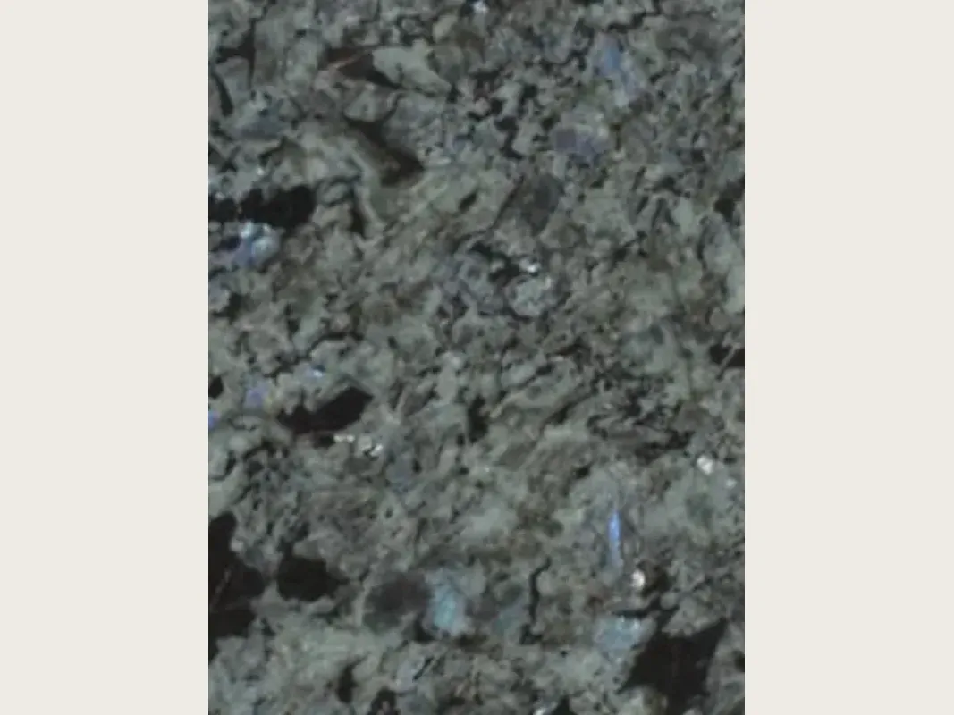 Slab of Labradorite granite: large greenish-gray crystals with iridescent blue flashes