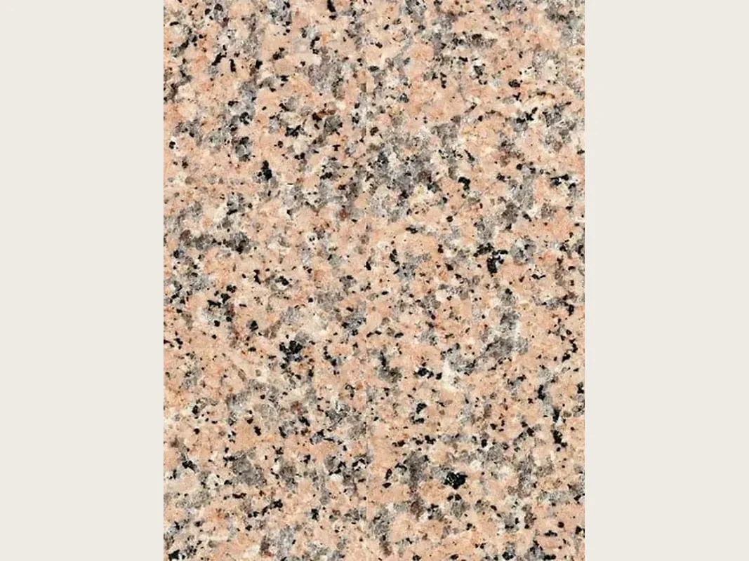 Rosa Porriño granite slab: medium-grain salmon pink with black and gray speckles