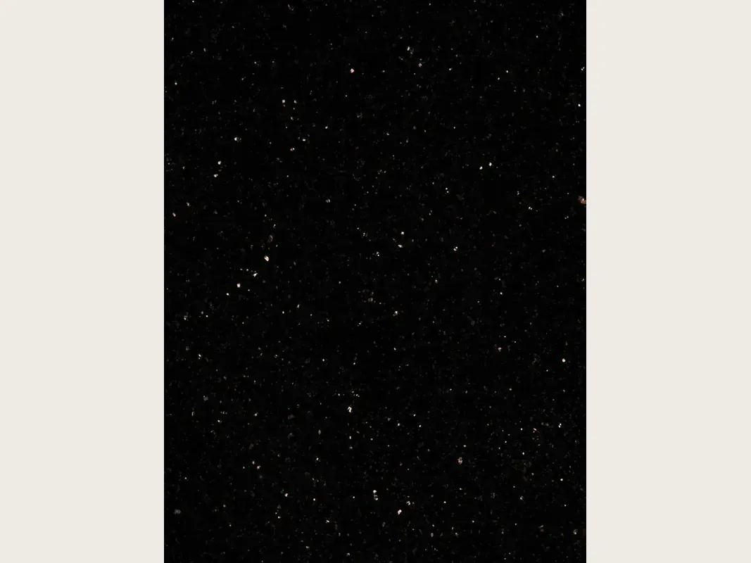 Black Star Galaxy granite slab: speckled black background with small shining gold and copper flecks