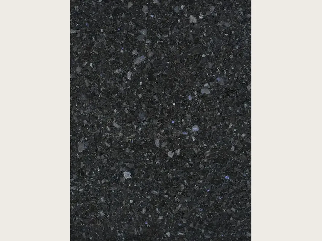 Black Stargate granite slab: grainy anthracite gray background with gray and violet crystals, polished finish