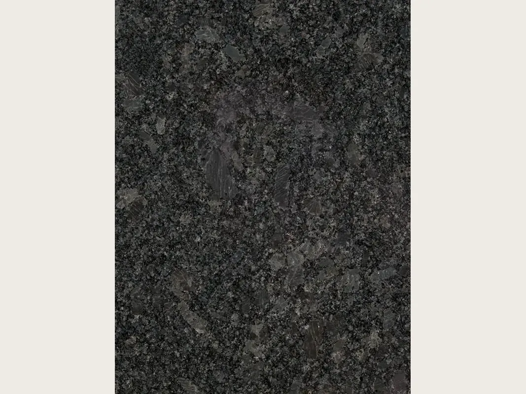 Steel Grey granite slab: medium steel-gray grain with lighter areas on an almost black background, polished