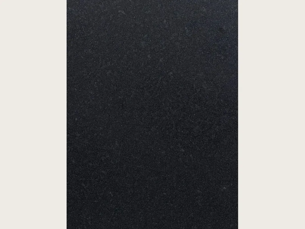 Titanium Black granite slab: a deep, uniform black, an extremely fine, barely visible grain and a matte surface