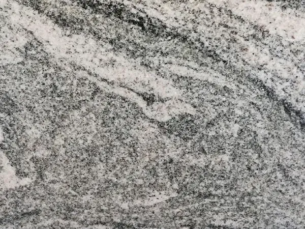 Verde Marina granite slab: wavy white and dark grey bands running diagonally over a medium grey background