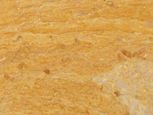 Giallo Reale marble detail: wavy bands of ochre and orange over the yellow background