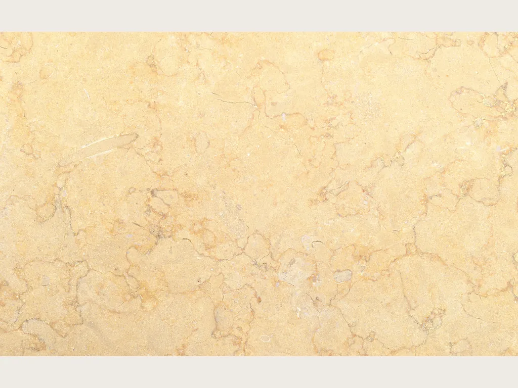 Giallo Silvia Oro marble slab: a pale creamy yellow background with fine lighter lines that are barely visible