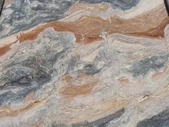 Close-up of gray Arabescato Orobico Grigiorosa marble: blue-gray and salmon pink waves mixed on the diagonal