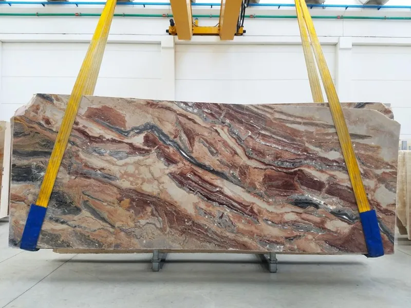 Red Arabescato Rosso marble slab: wavy horizontal bands of brick red, cream and blue gray (another slab)