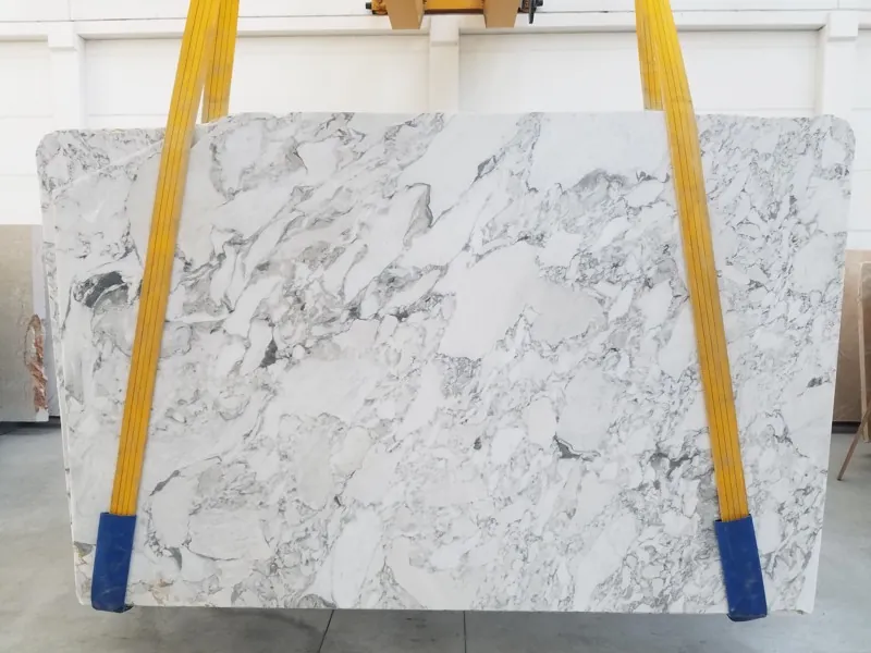 White Arabescato Vagli marble slab: a fine web of light gray veins around white fragments (another slab)