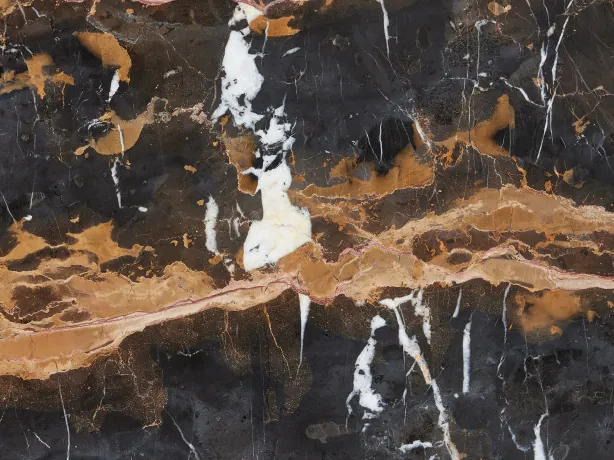 Detail of Black & Gold marble: a thick gold band and white veins over the black