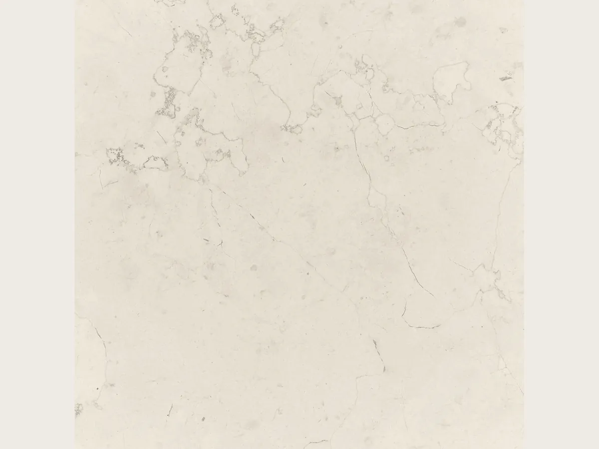 Bianco Perlino marble slab: ivory background with scattered fine gray veins