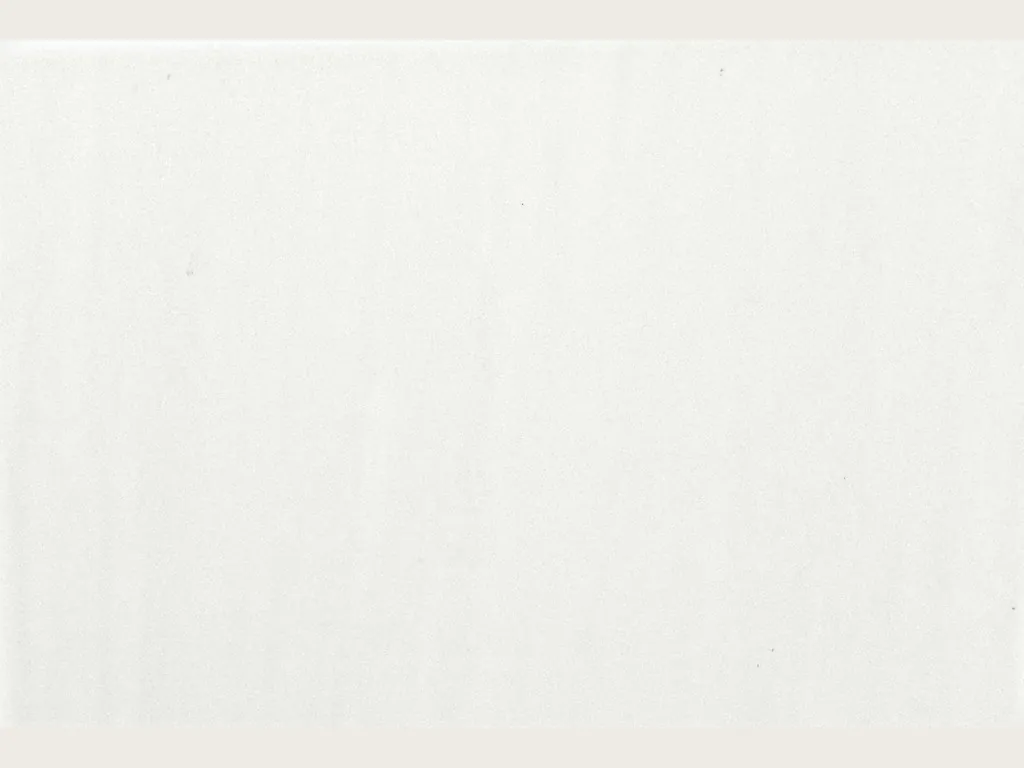 Bianco Sivec marble slab: a pure, even white with faint, almost invisible vertical lines