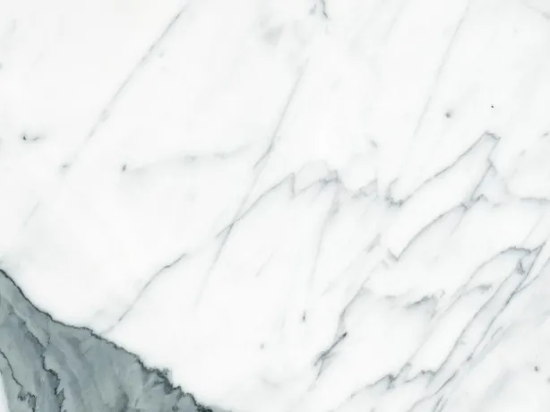 Close-up of white Statuario marble with the gray-green vein and fine gray branching