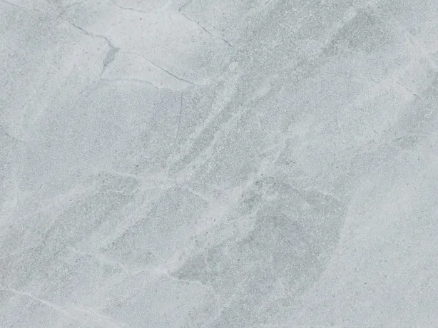 Close-up of the gray Bleu de Savoie marble slab: a fine web of light veins over the blue-gray