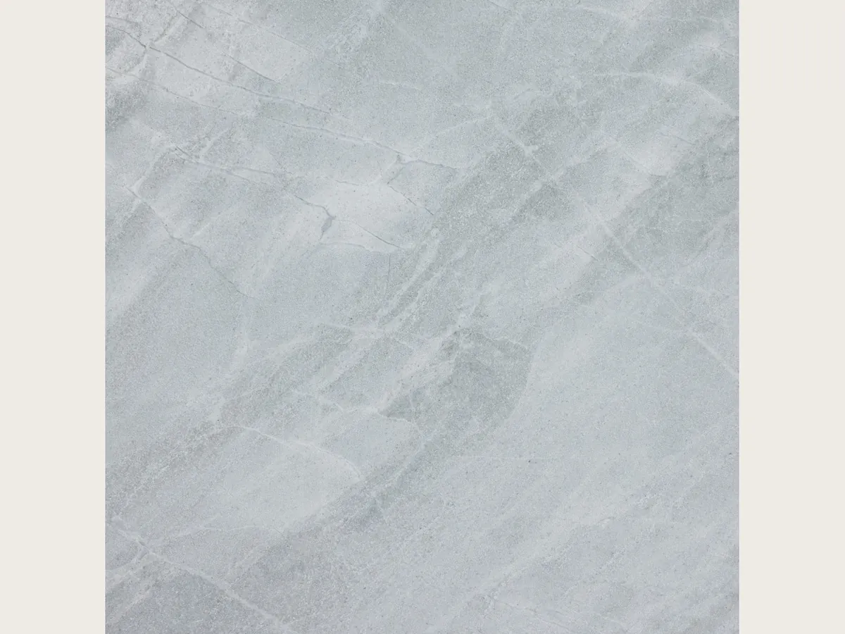 Gray Bleu de Savoie marble slab: a blue-gray background with a fine net of light veins and lighter clouds