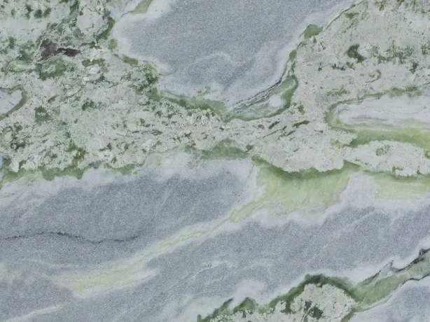 Close-up of green Bloody Mary marble: the jagged edges of the green bands over the blue-gray